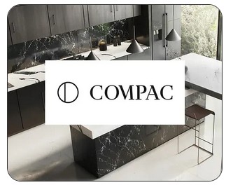 compac-logo Modern kitchen with COMPAC logo and marble decor.