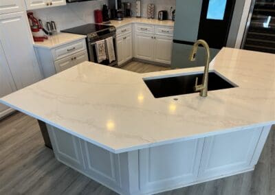 kitchen island with white quartz countertop